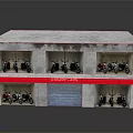Honda Motorcycles Displayed in Two Story Building With Red Signboard and Windows
