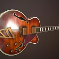 Classic Red Semi Hollow Body Electric Guitar With F Hole And Inlaid Fretboard Design