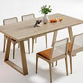 Light Wood Dining Table Set With Rattan Back Chairs Brown Cushions And Decorative Vase
