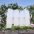 Floral Installation Archway With Green Vines Pink Flowers And White Drapes