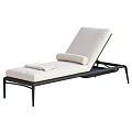 Outdoor Lounge Chair with Black Metal Frame White Cushion Rolled Pillow and Folded Towel