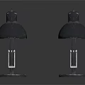 Two Stylish Black Minimalist Table Lamps On White Reflective Surface