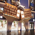 Modern Boutique Guesthouse Building With Bear Themed Sign Arched Entrance And Green Plants