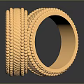 Two Stylish Gold Fashion Rings With Intricate Textured Patterns On Black Surface