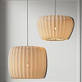 Two Modern Beige Pleated Shade Pendant Lights Hanging In Interior Design