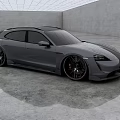 Gray Porsche Sports Wagon In Indoor Space With Grid Ceiling And Smooth Concrete Floor Reflection