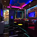 Modern KTV Interior With Comfortable Sofas Large Screens Colorful Lighting And Decorative Murals 3d model