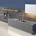Modern Kitchen With Gray Cabinets Blue Wall Wooden Accent Countertop Sink And Stove