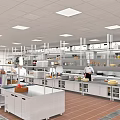 Commercial Restaurant Kitchen With Chefs Working Stainless Steel Appliances Storage Cabinets And Bright Lighting