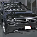 Black 2024 Volkswagen SUV With Shiny Exterior Front Grille And Modern Building Background