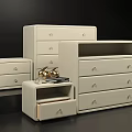 Modern White Dressers with Multiple Drawers and Decorative Items on Top