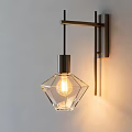 Modern Wall Lamp With Transparent Diamond Glass Shade Metal Bracket and Warm Light On Wall