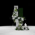 Elegant Floral Installation with White Flowers Green Foliage and Decorative Columns
