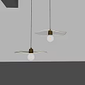 Modern Two Pendant Lights With Leaf Shaped Transparent Shades Brass Bases And Clear Bulbs