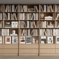 Modern Multi Section Bookshelf Interior With Stacked Books Decorative Sculptures And Photo Frames