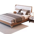 Modern Double Bed With Upholstered Headboard Pillows Brown Blanket Wooden Nightstand And Light Gray Rug