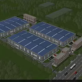 Industrial Factory Complex With Blue Roofs Green Surroundings And Road Access