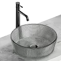 Elegant Diamond Textured Glass Washbasin With Modern Silver Faucet On Marble Countertop