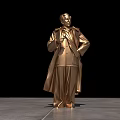 Golden Human Figure Landscape Sculpture With Long Coat Hands on Hips