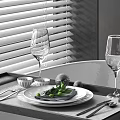 Elegant Dinnerware Set With Plates Cutlery Wine Glasses And Green Leaves On Dining Table