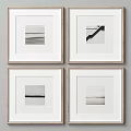 Four Black And White Framed Artworks Hanging On Minimalist Wall Decor