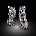 Two Irregular Wood Stone Decorative Pieces With Natural Texture On Black Background