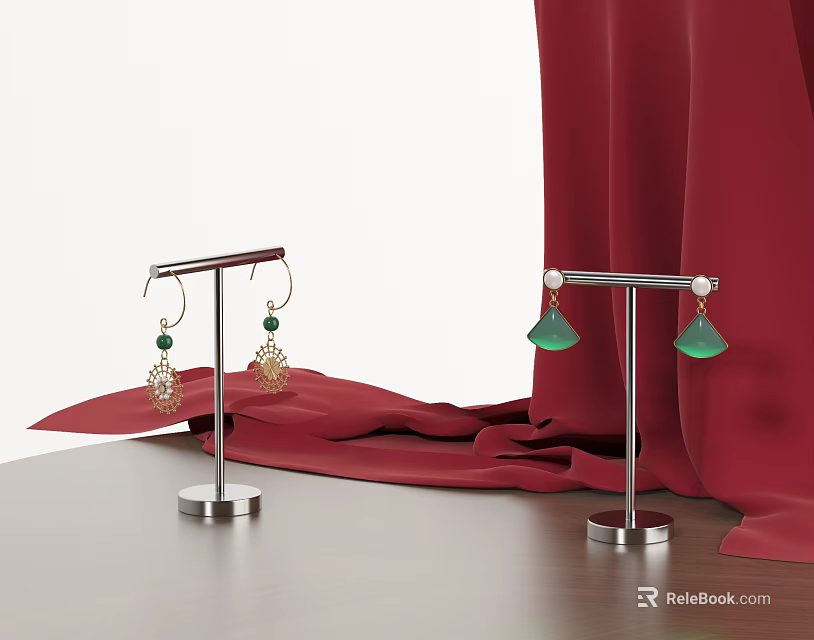 Elegant Jewelry Earrings With Green Gemstones On Metal Stands Red Fabric Wooden Table 3d model 