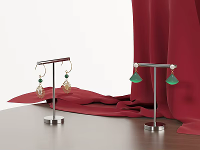 Elegant Jewelry Earrings With Green Gemstones On Metal Stands Red Fabric Wooden Table 3d model