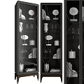 Modern Black Sideboard With Glass Doors Holding Vases Wine Glasses Books And Candles