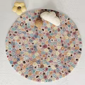 Round Rug with Vibrant Multicolored Patterns and Decorative Items on Surface 3d model