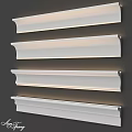 White Decorative Mouldings With Illuminated Design And Different Profiles On Dark Wall