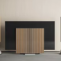 Modern Flat Screen TV With Wooden Cabinet And Tower Speakers Against Beige Wall