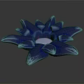 Blue Sea Anemone With Petal Like Structures And Translucent Body On Dark Background