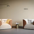 Elegant Armchairs with Woven Details Beige White Upholstery and Small Coffee Table in Modern Room