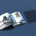 Open Magazine Featuring Interior Design Images With Black Book Beside 3d model