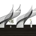 Modern Black and White Spiral Staircase with Green Plant and Decorative Figurine Interior
