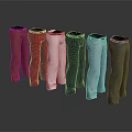 Various Colored Pants with Black Belts on Grey Smooth Surface
