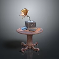 Vintage Gramophone On Wooden Table With Carved Legs And Small Items