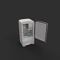 White Refrigerator Freezer With Open Door And Interior Shelves On Black Background