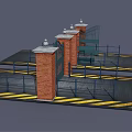 Entrance Gate With Brick Pillars Black Iron Design And Yellow Warning Stripes On Ground