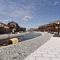 Traditional Commercial Street With Traditional Style Buildings Small River And Stone Paved Path
