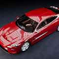Red Sports Car With Modern Sleek Design Streamlined Body And Silver Alloy Wheels