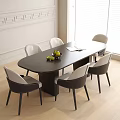 Oval Dark Dining Table And Chairs Set With Fruit Bowl Open Book In Bright Room