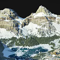 Breathtaking Mountain Landscape With Snow Capped Peaks Turquoise Lake And Lush Green Forest