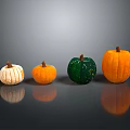 Four Colorful Pumpkins White Striped Orange And Green Arranged On Gray Background With Clear Reflections