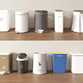 Various Trash Bins With Different Designs Colors And Materials On Shelves 3d model