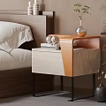 Modern Wooden Nightstand With Orange Accent Black Metal Legs And Vase With Plant Books