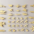 Gold Airplane Shaped Wall Decor With Various Sizes On Light Background 3d model