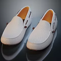 White Leather Loafers Shoes With Brown Accents And Lightweight Sole On Reflective Surface