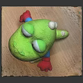 Green Lizard Stuffed Animal With Blue Outfit And Red Gloves On Wooden Platform
